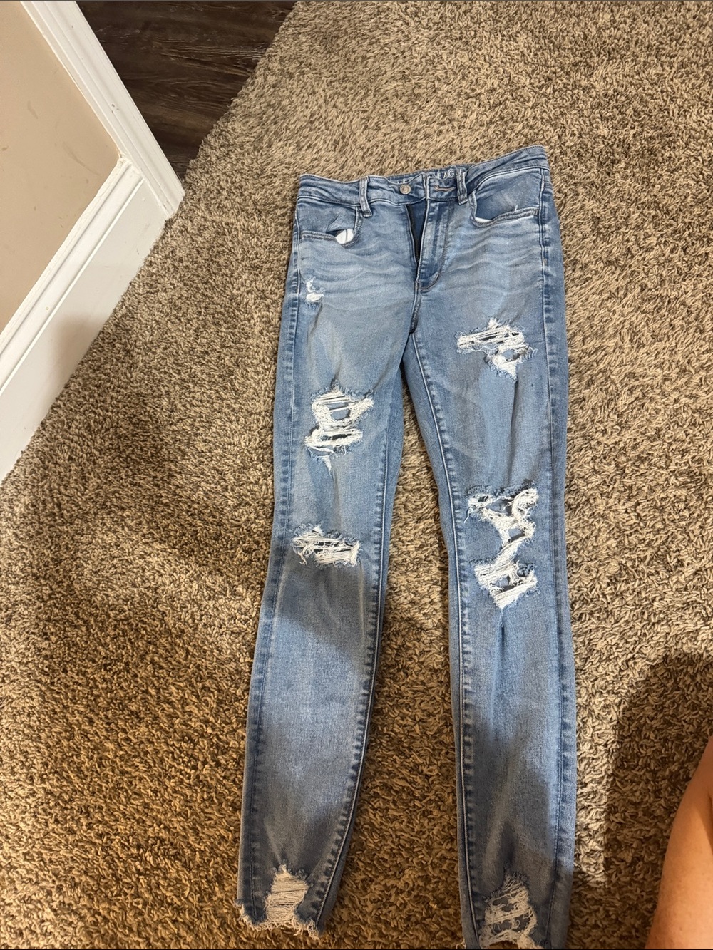 American Eagle high rise  Light Blue Distressed Skinny Jeans